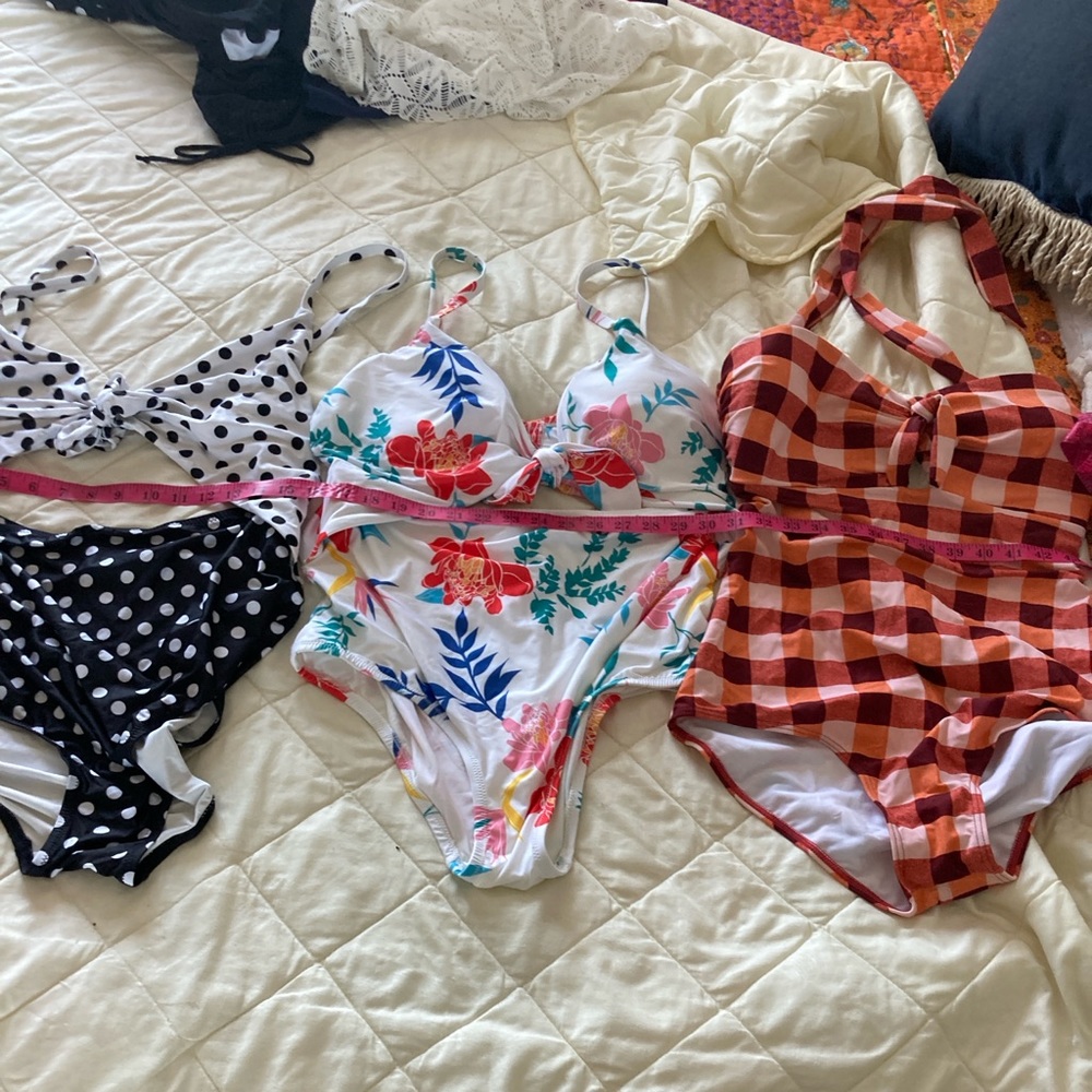 Three swim suits size 2XL.